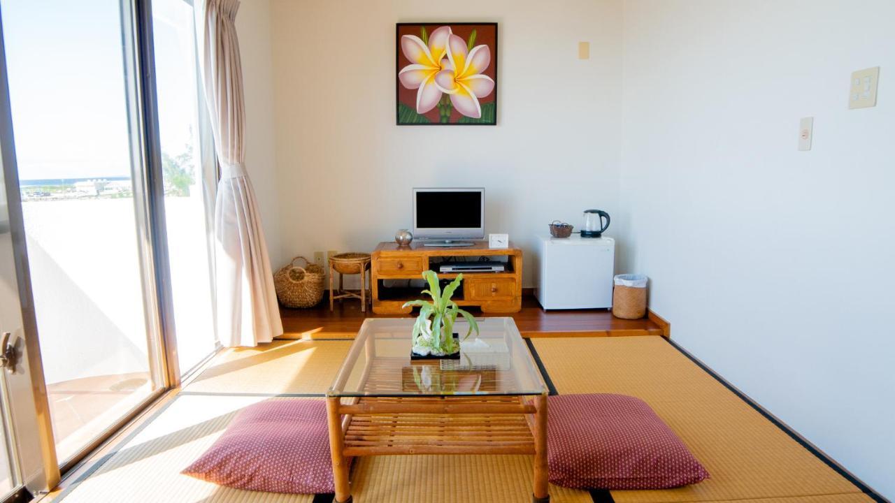 Sunset Beach House Onna Bagian luar foto