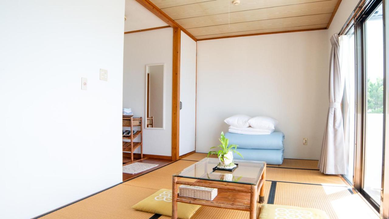 Sunset Beach House Onna Bagian luar foto