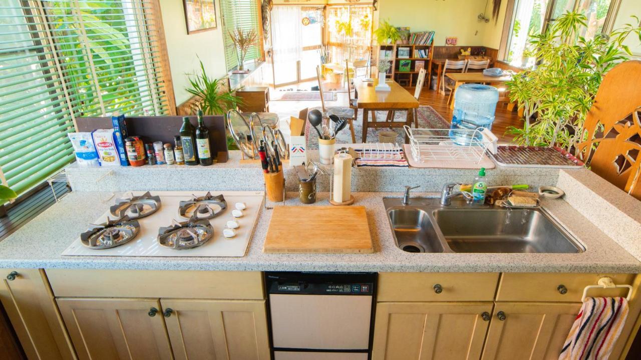 Sunset Beach House Onna Bagian luar foto